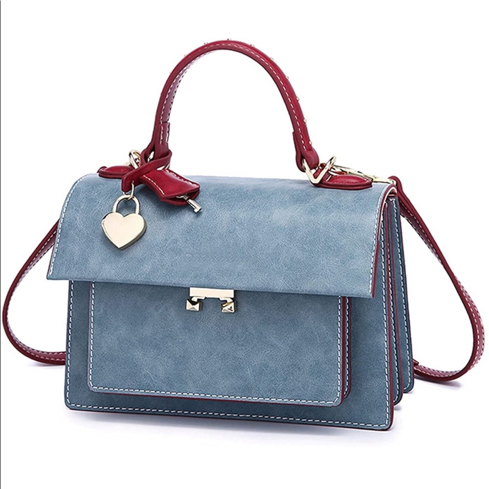 light weight Crossbody bag in light blue with red Accent color